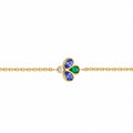 Bee The One 18k yellow gold station bracelet with iolite, tsavorite, and diamond shown on a white background.