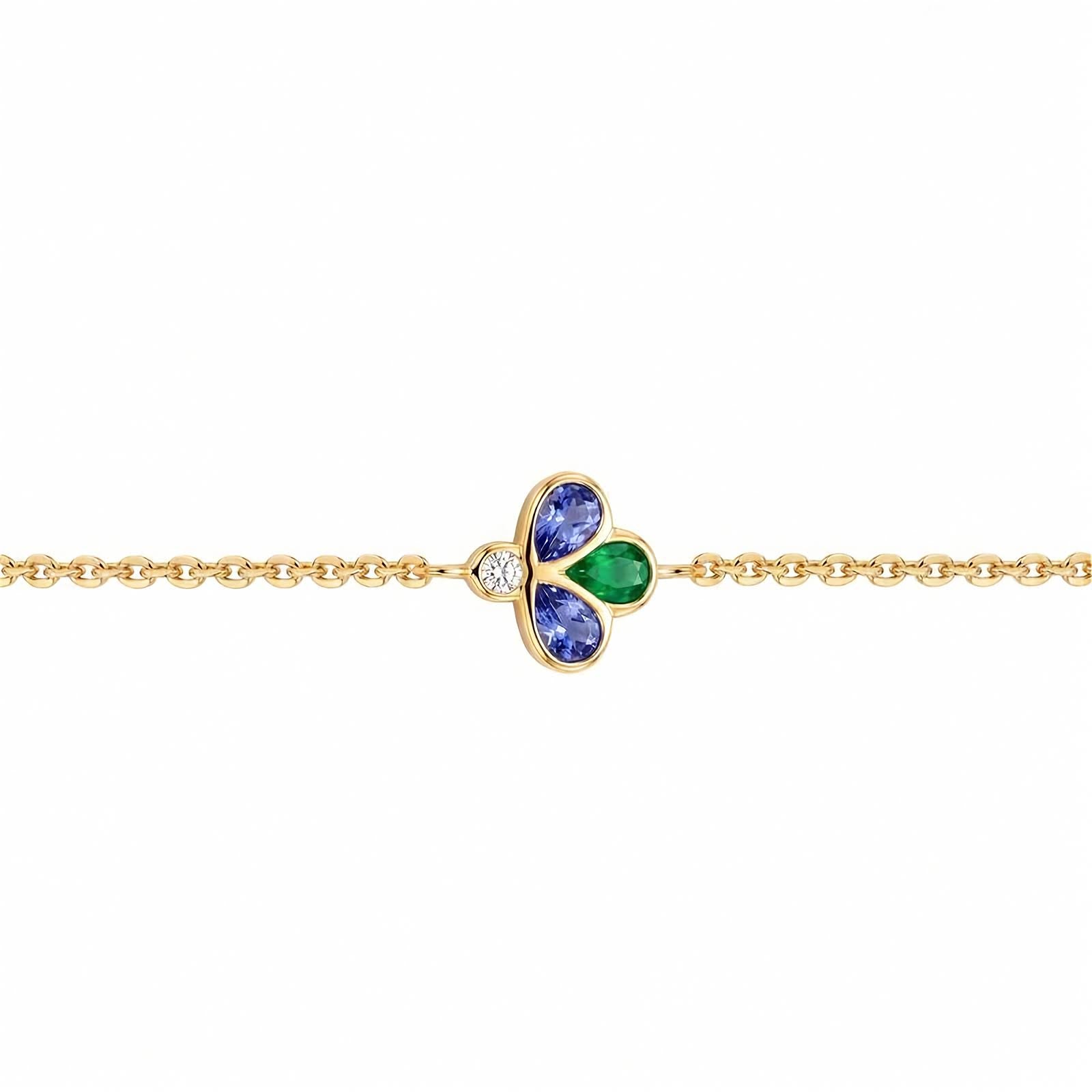 Bee The One 18k yellow gold station bracelet with iolite, tsavorite, and diamond shown on a white background.