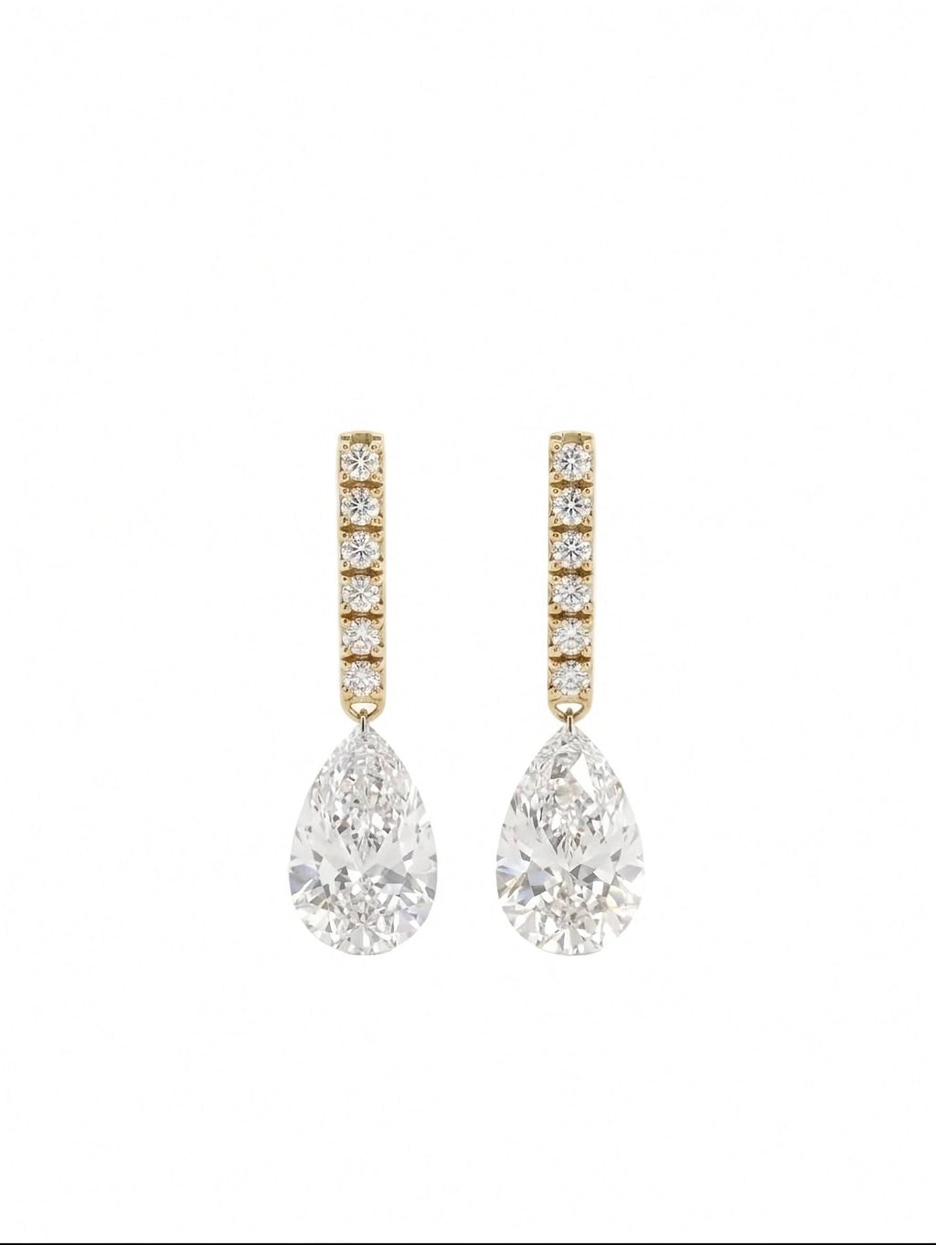 A pair of gold drop earrings featuring a vertical bar of small round-cut diamonds above a large pear-cut diamond drop, set against a clean white background.
