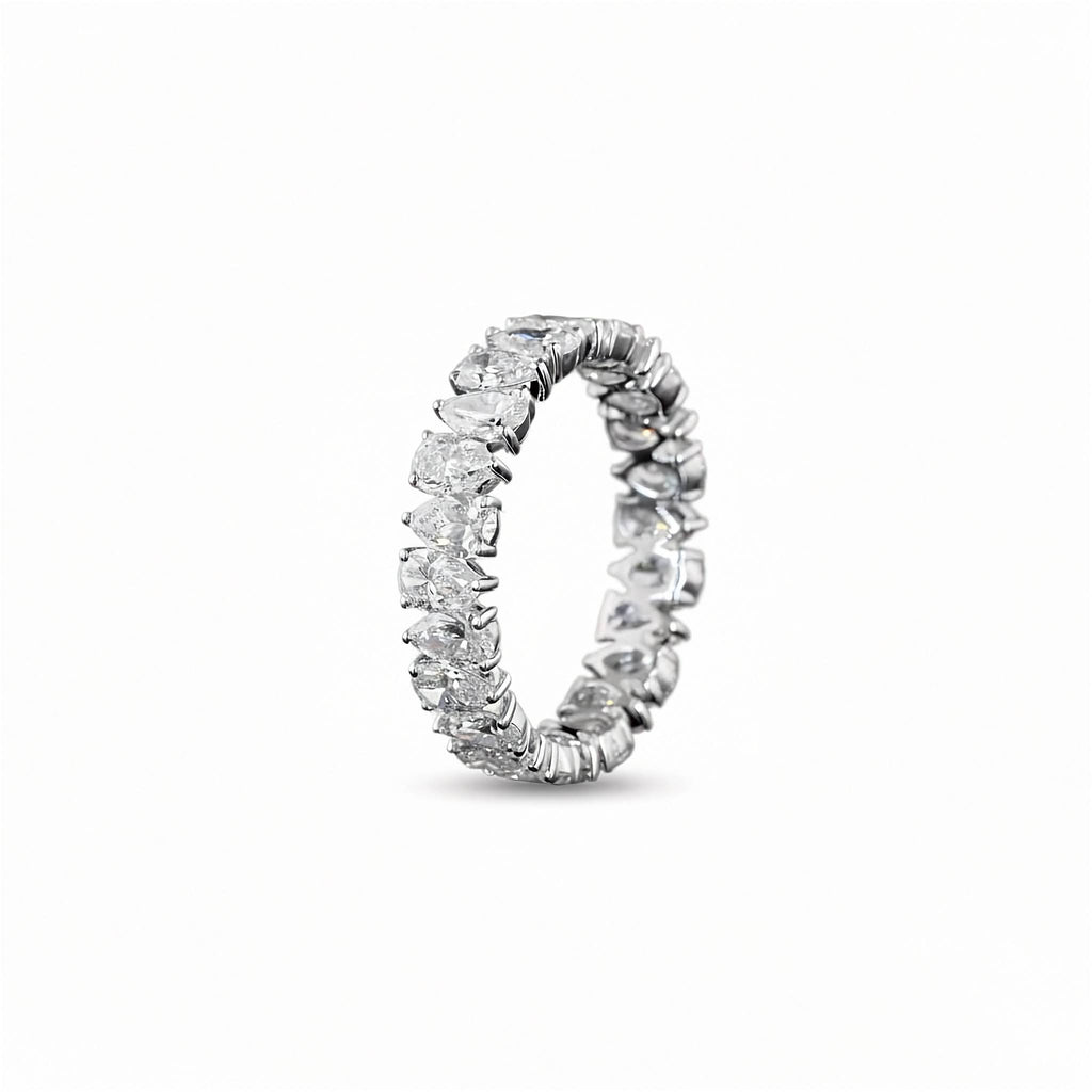 A white gold Pear Diamond Prong set full eternity ring featuring a continuous row of pear cut lab grown diamonds, shown on a clean white background.