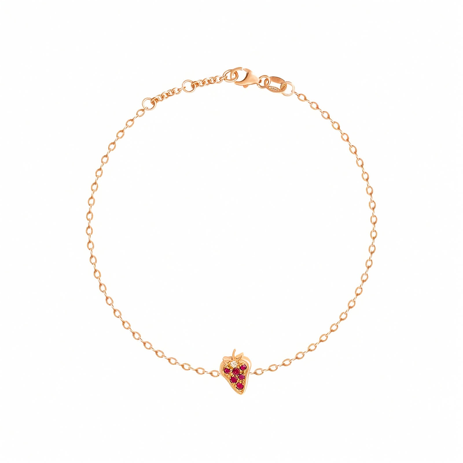 Rosmundo collaboration 18k rose gold strawberry chain bracelet with natural rubies and diamond. A delicate rose gold chain bracelet with a small strawberry shaped charm set with red stones, displayed on a clean white background.