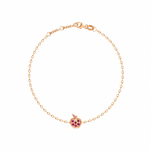 Rosmundo collaboration 18k rose gold apple chain bracelet with natural rubies and diamond. A delicate rose gold chain bracelet with a small apple charm featuring pink gemstone accents, displayed on a clean white background.