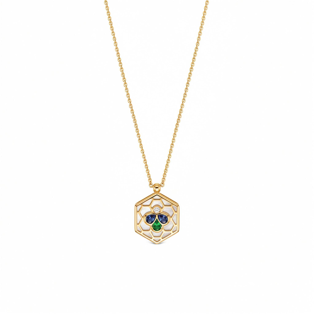 Bee Icon 18k yellow gold necklace with iolite, tsavorite, mother of pearl, and diamond shown on white background.
