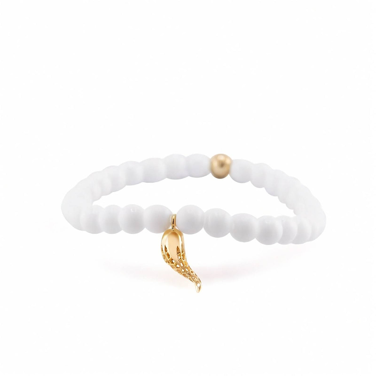 18k Yellow Gold Rosmundo Italian Corno Charm Bracelet with 6mm White Agate Beads. A white beaded stretch bracelet with a small gold horn charm and a single gold accent bead, shown on a clean white background.